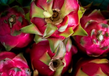 Where can I find local produce on Guam?